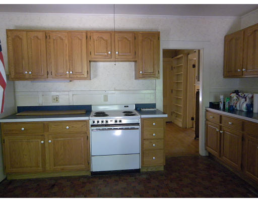 385 Trapelo Road Waltham, MA 02452 - Photo 2 of 4 a kitchen with stainless steel appliances granite countertop a refrigerator a stove and a sink