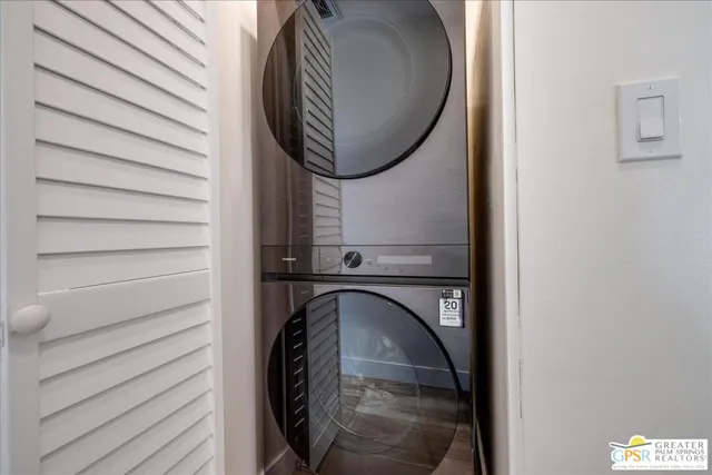 a swimming pool with outdoor seating