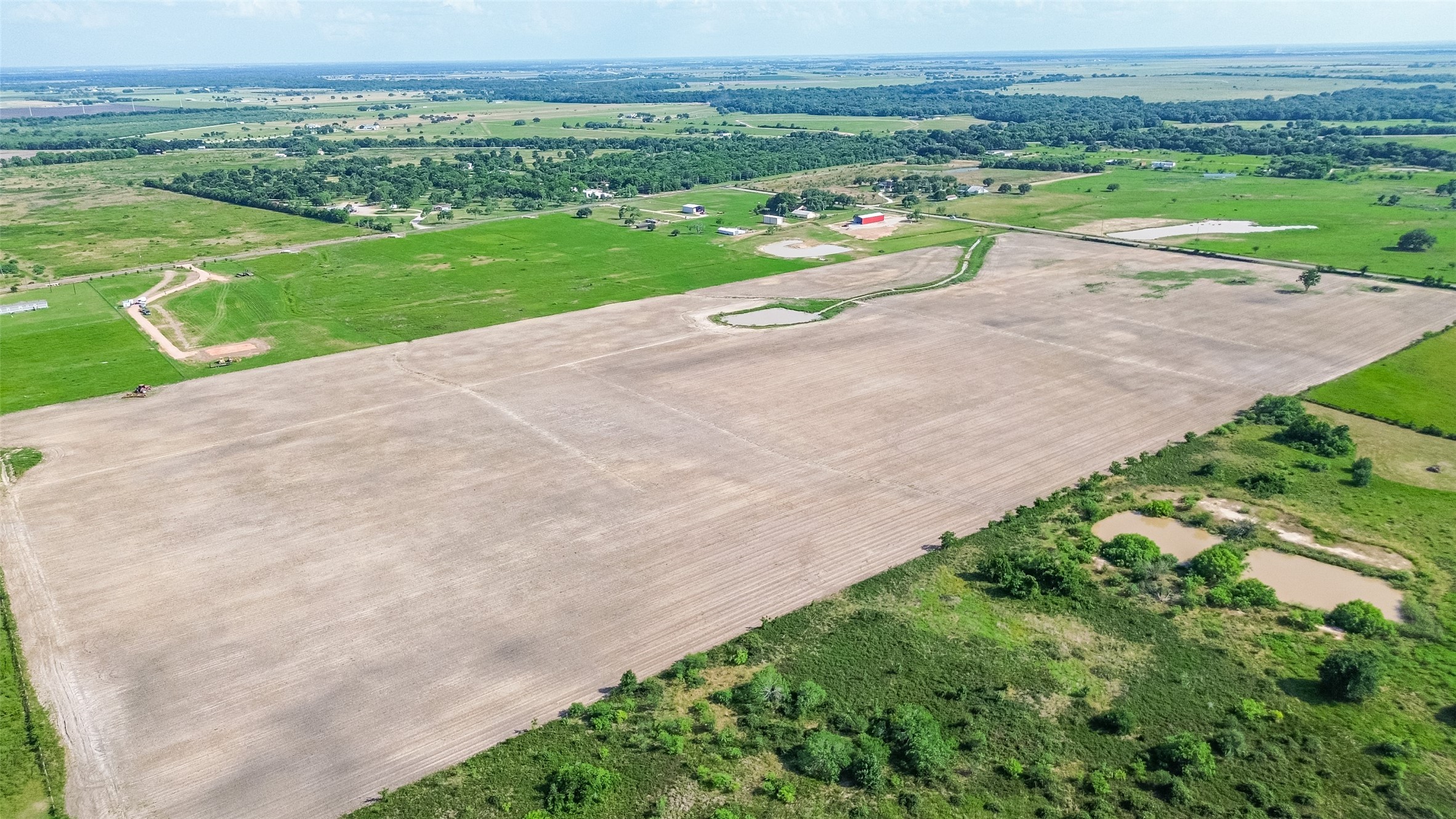 0 Johnston Road Wallis, TX 77485 - Photo 7 of 12 an aerial view of a yard with an outdoor space and seating