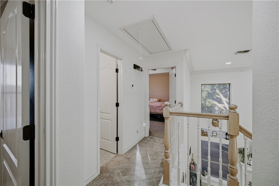 337 Wright Drive Portland, TX 78374 - Photo 16 of 30 a view of a hallway with a livingroom and furniture