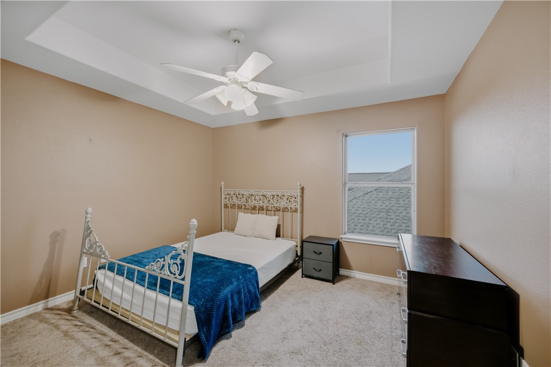 337 Wright Drive Portland, TX 78374 - Photo 17 of 30 a bedroom with a bed and a window