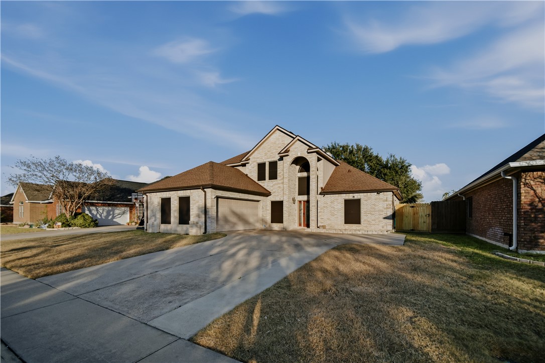 337 Wright Drive Portland, TX 78374 - Photo 26 of 30 a front view of a house with a yard