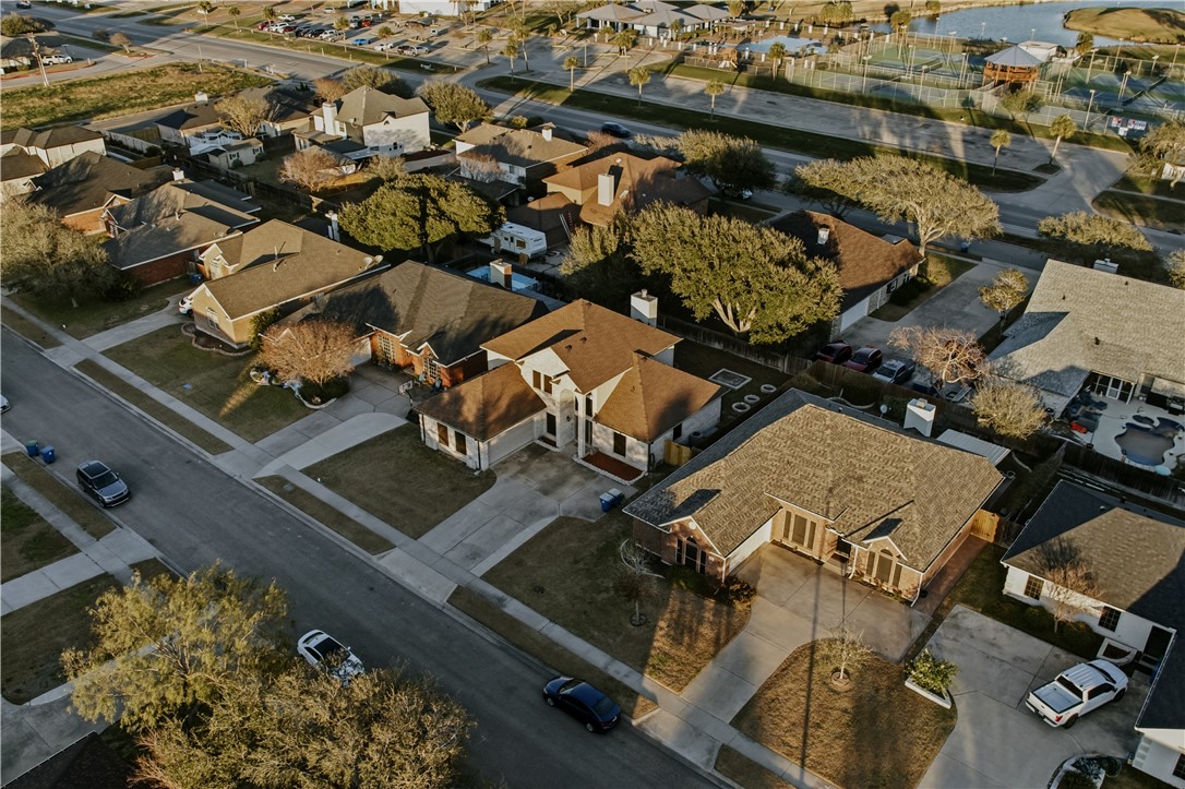 337 Wright Drive Portland, TX 78374 - Photo 28 of 30 an aerial view of multiple houses with yard