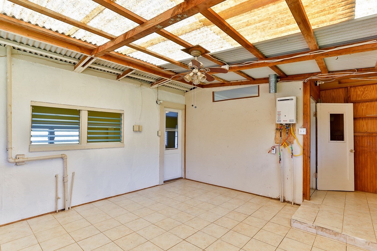 43-350 Pohakea Road, Unit 9 Paauilo, HI 96776 - Photo 23 of 28 a view of a room with wooden walls