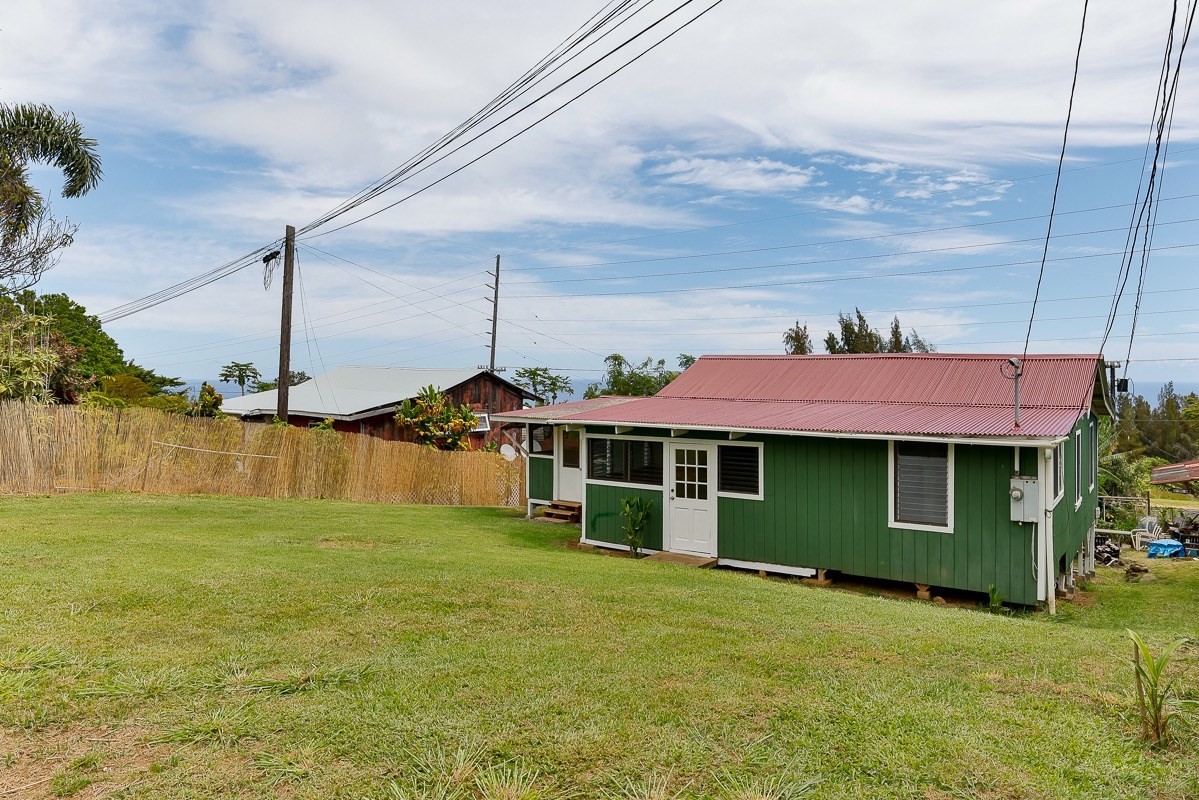 43-350 Pohakea Road, Unit 9 Paauilo, HI 96776 - Photo 25 of 28 a view of a house with a yard