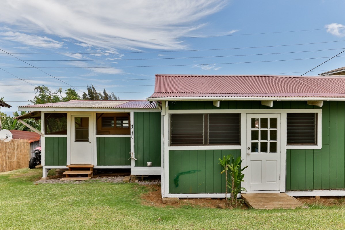 43-350 Pohakea Road, Unit 9 Paauilo, HI 96776 - Photo 26 of 28 a view of a house with a yard and plants