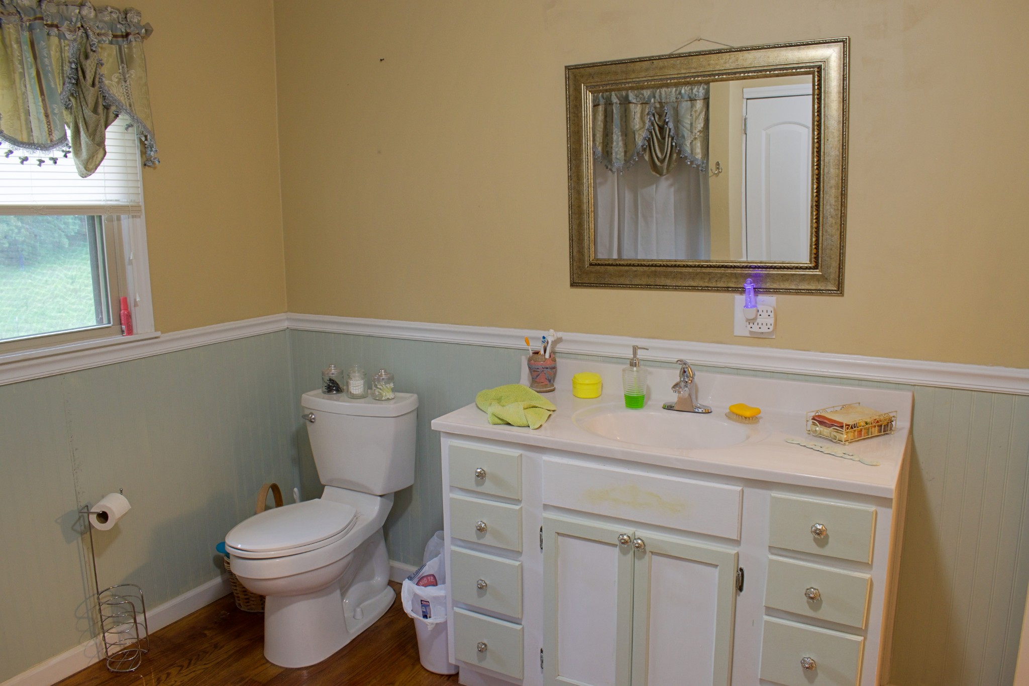 2756 Sullivan Knowles Road Sparta, TN 38583 - Photo 9 of 12 a bathroom with a sink vanity and mirror
