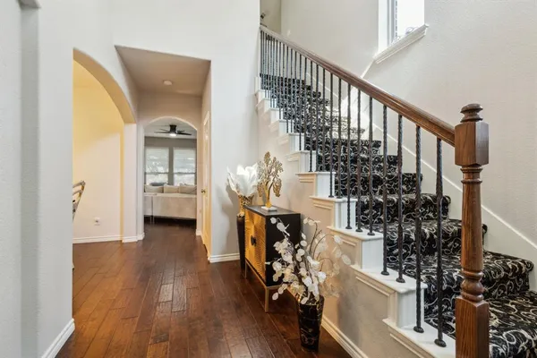 a view of entryway with wooden floor