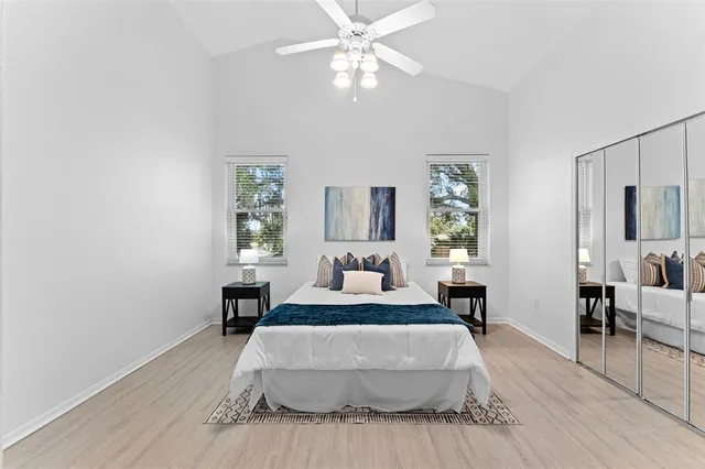 a bathroom with a shower sink and mirror