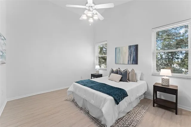 a bedroom with a bed and walk in closet