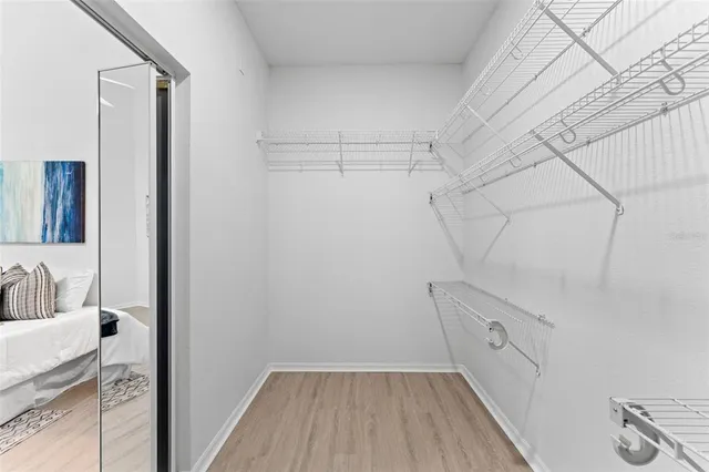 a bathroom with a sink mirror toilet and bathtub