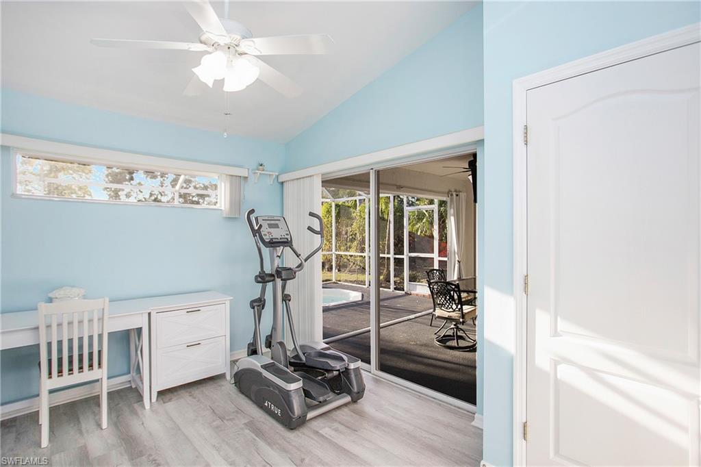 21722 Windham Run Estero, FL 33928 - Photo 21 of 40 a view of a room with gym equipment