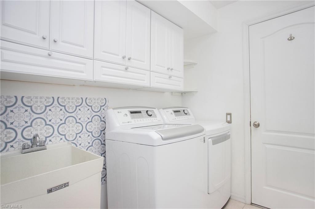 21722 Windham Run Estero, FL 33928 - Photo 22 of 40 a utility room with dryer and washer