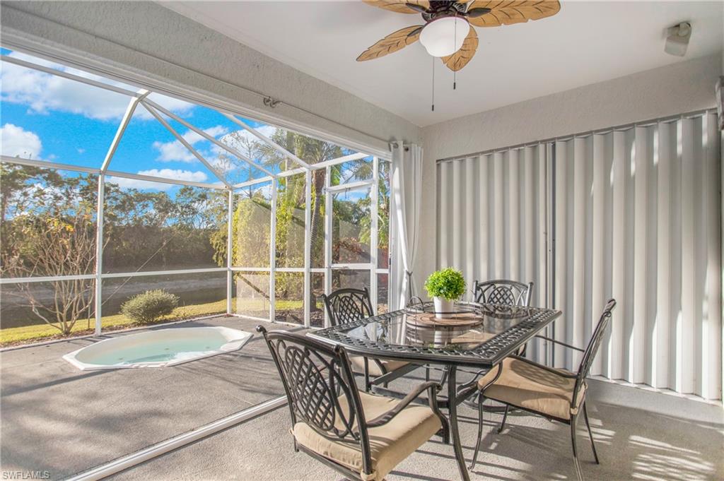 21722 Windham Run Estero, FL 33928 - Photo 24 of 40 a dining room with furniture and chandelier