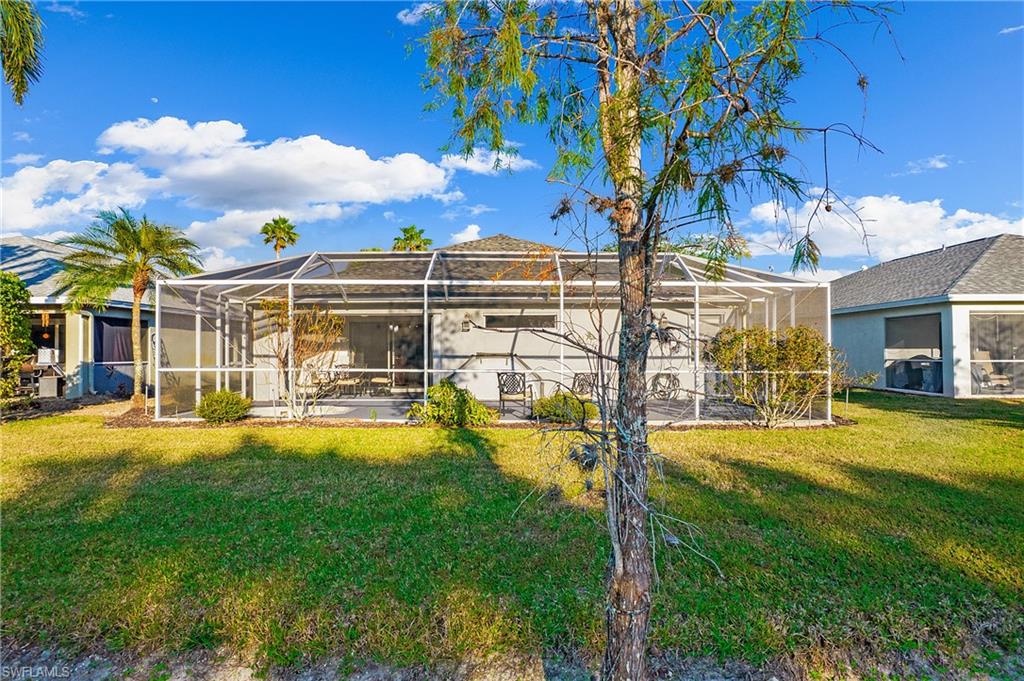 21722 Windham Run Estero, FL 33928 - Photo 26 of 40 a view of a house with swimming pool