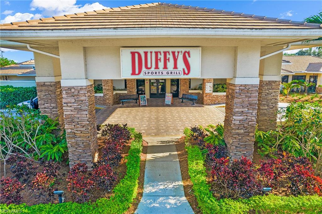 21722 Windham Run Estero, FL 33928 - Photo 33 of 40 a view of a entryway door of house