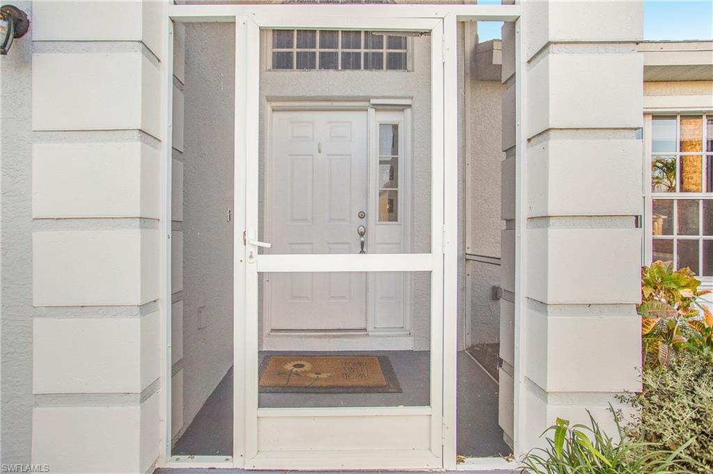 21722 Windham Run Estero, FL 33928 - Photo 8 of 40 a bathroom with a tub and a shower