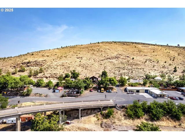 a view of a balcony with chairs