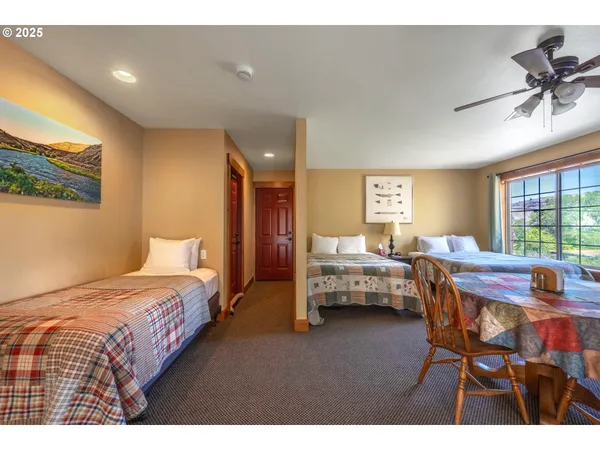 a bedroom with furniture and a bed