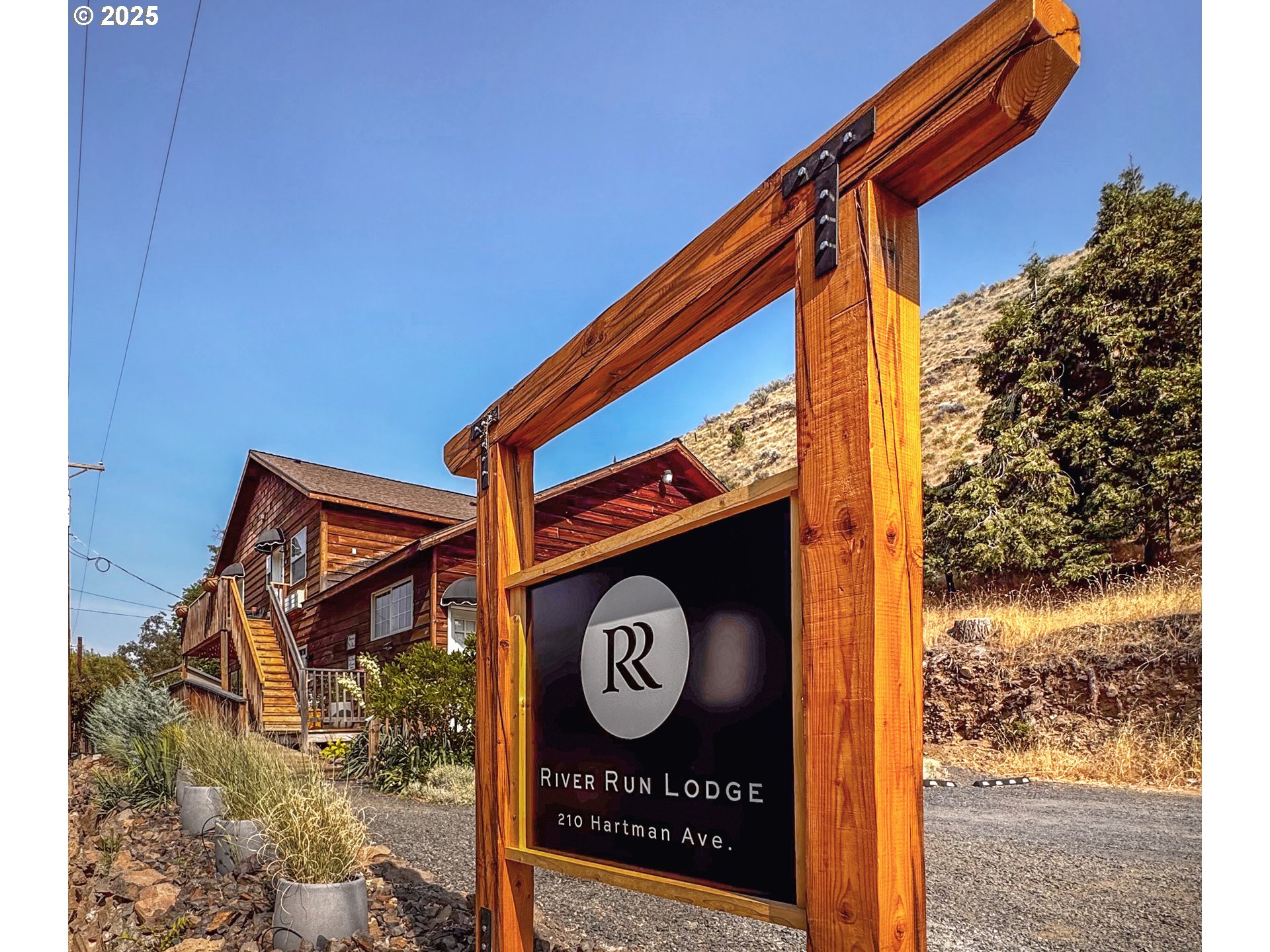 210 Hartman Avenue Maupin, OR 97037 - Photo 43 of 46 a front view of a house with garden