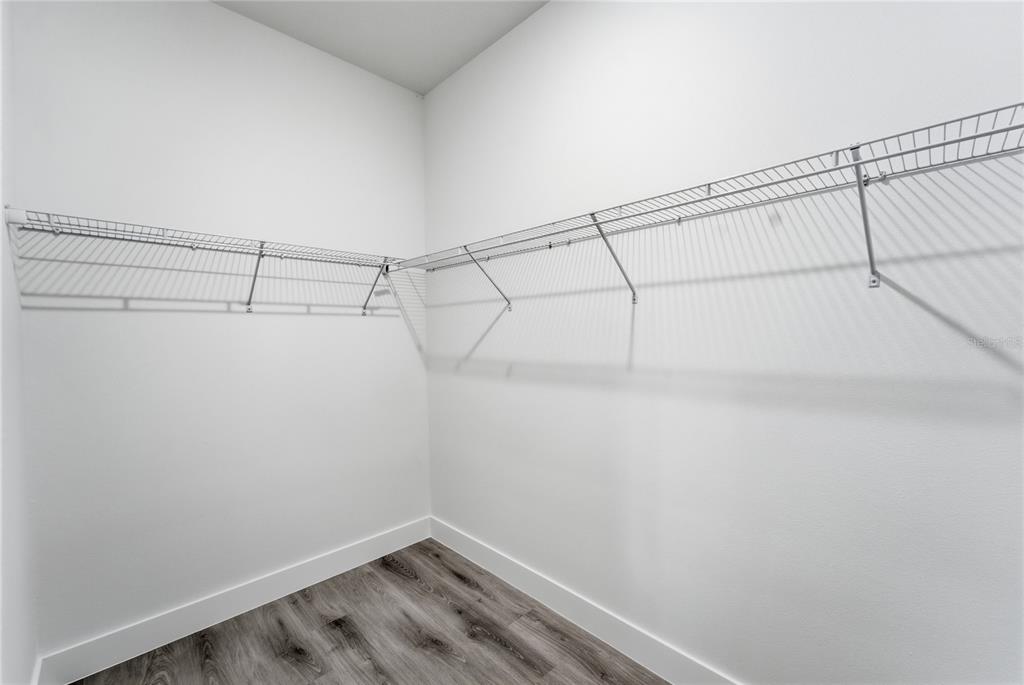 2600 Southwest 146th Pl Road Ocala, FL 34473 - Photo 27 of 40 a view of a room with racks on the wall