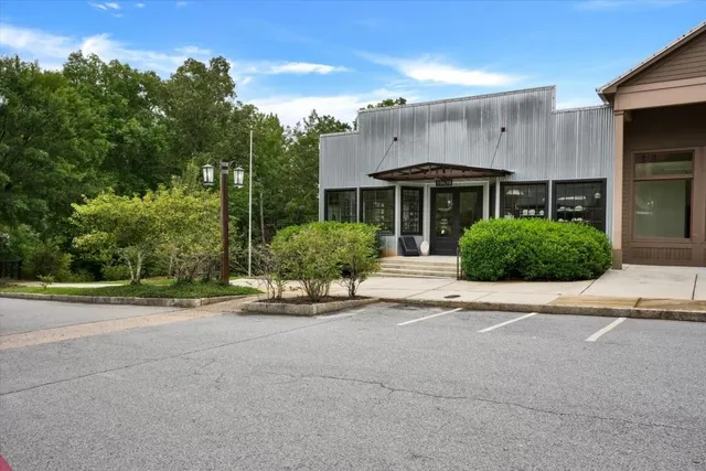 front view of a house with a garden
