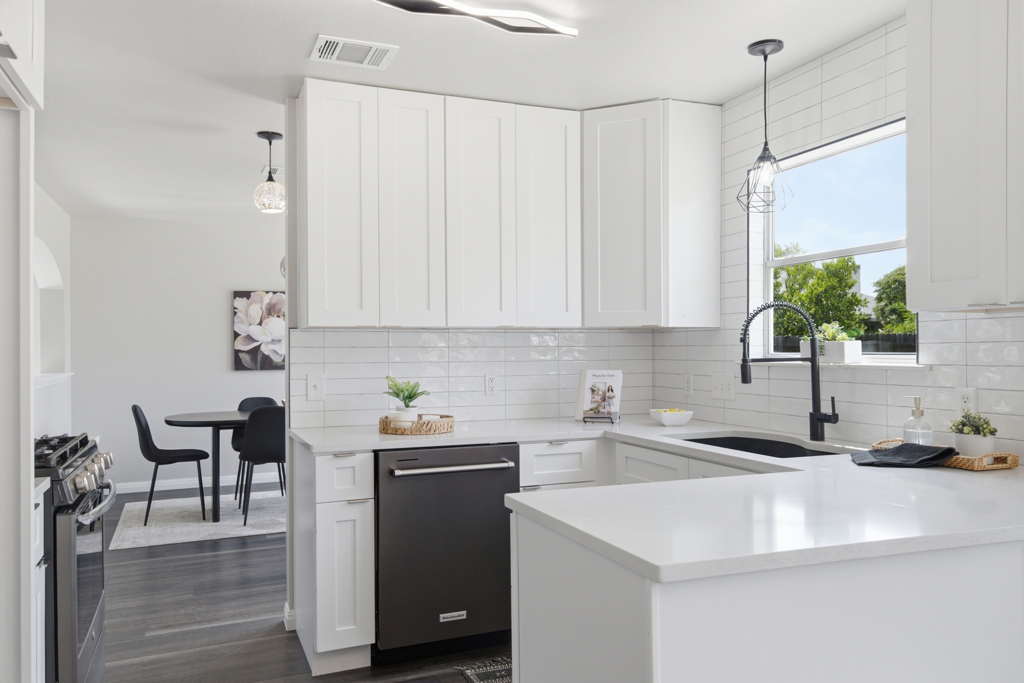 1504 Waterfall Avenue Leander, TX 78641 - Photo 10 of 25 SS appliances and matte black fixtures add just the right contrast.