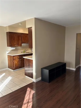 a spacious bathroom with a sink and a mirror