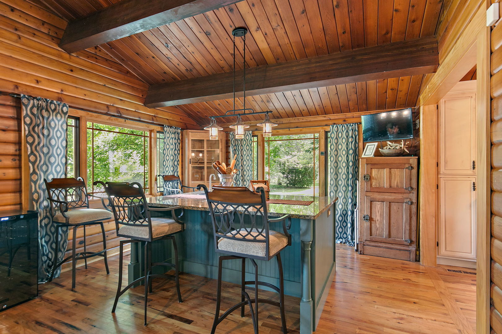 41W591 Lenz Road Elgin, IL 60124 - Photo 13 of 48 a dining room with furniture and wooden floor