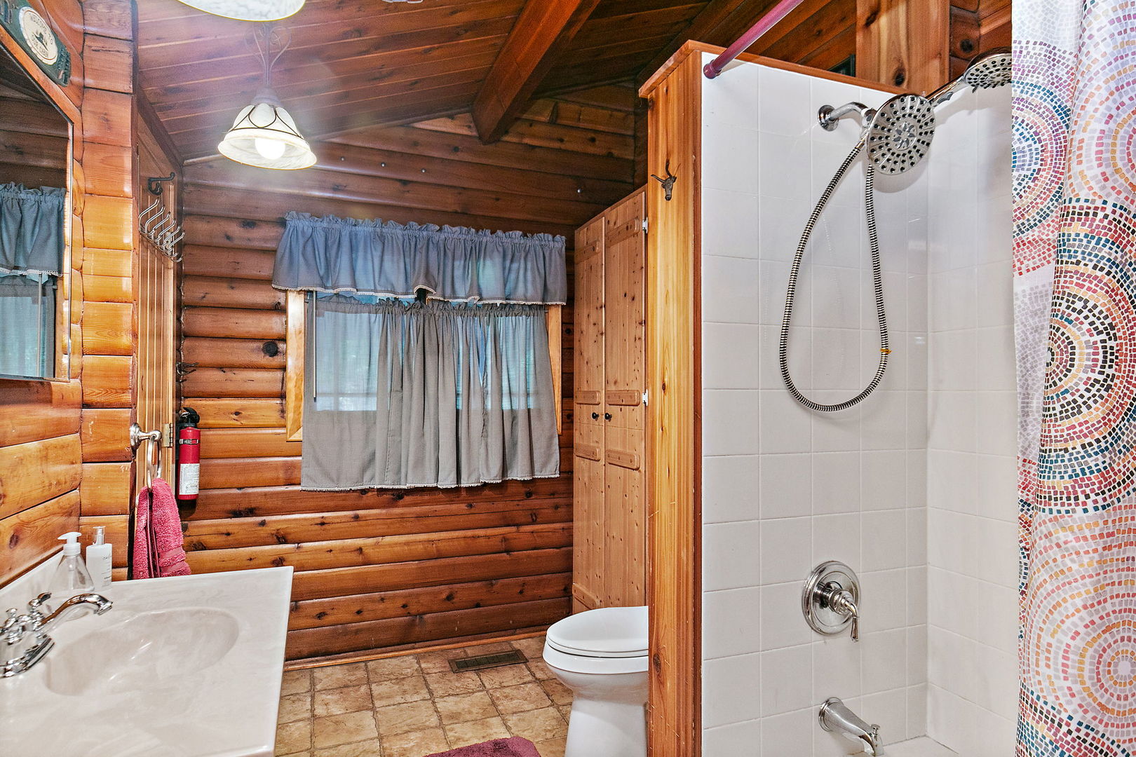 41W591 Lenz Road Elgin, IL 60124 - Photo 22 of 48 a bathroom with a granite countertop sink and a mirror