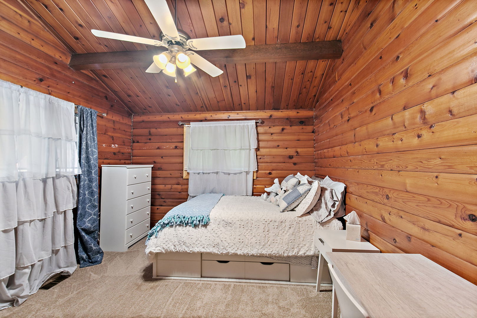 41W591 Lenz Road Elgin, IL 60124 - Photo 25 of 48 a bedroom with a bed and a chandelier