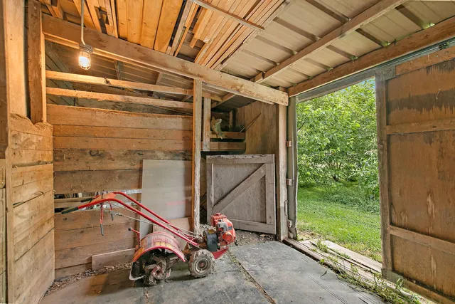 a view of a storage room with wooden floor