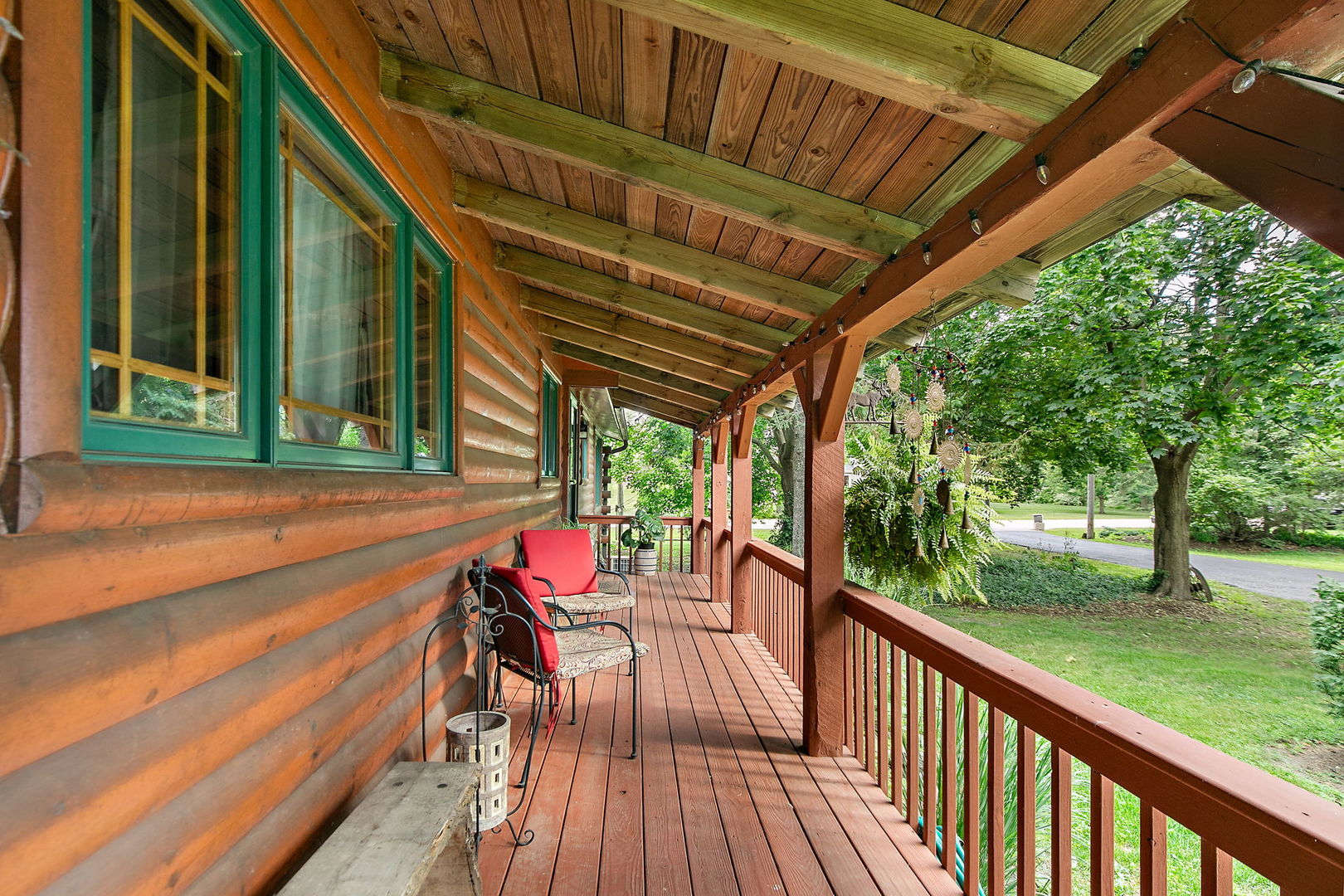 41W591 Lenz Road Elgin, IL 60124 - Photo 6 of 48 a view of a patio with lawn chairs floor to ceiling window with wooden floor