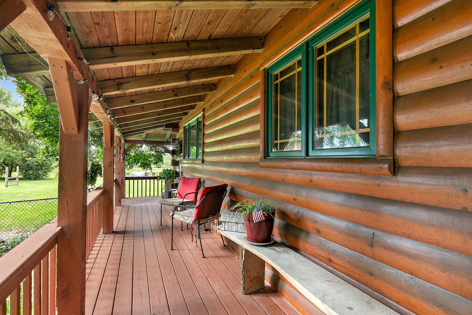 41W591 Lenz Road Elgin, IL 60124 - Photo 7 of 48 a view of a deck with wooden floor and outdoor seating