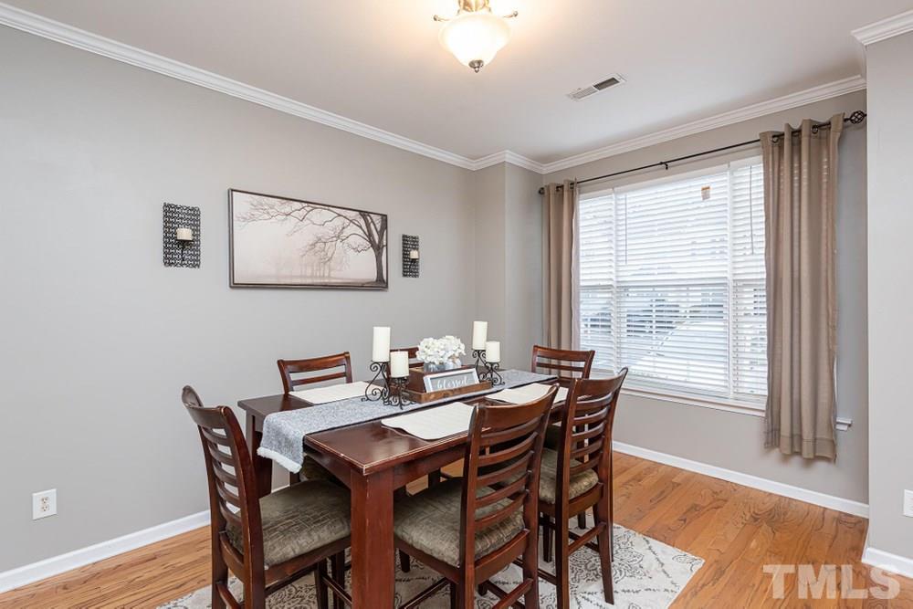 8451 Reedy Ridge Lane Raleigh, NC 27613 - Photo 3 of 30 Spearate Dining Room with large triple window.