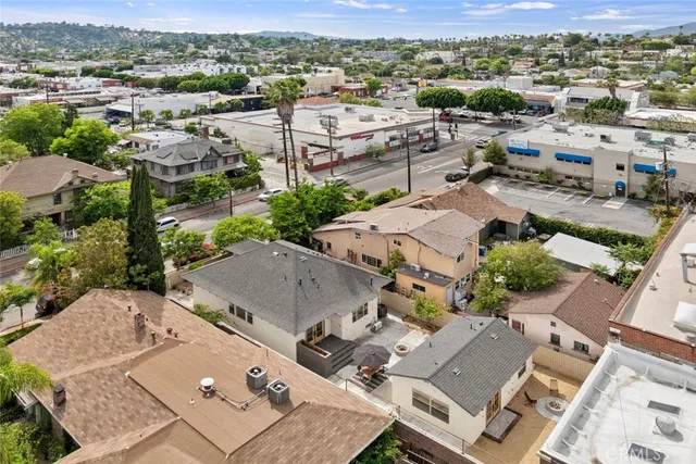 a kitchen with a table and chairs