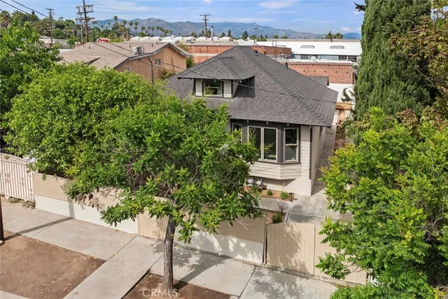 a bathroom with a toilet sink and shower
