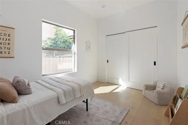 a kitchen with sink stove and cabinets