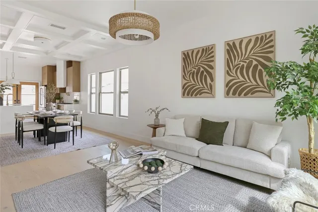 a view of a house with potted plants
