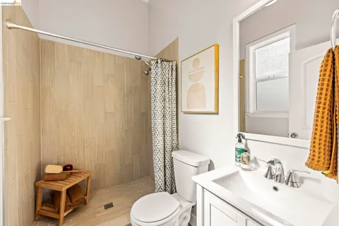 a view of house with a yard