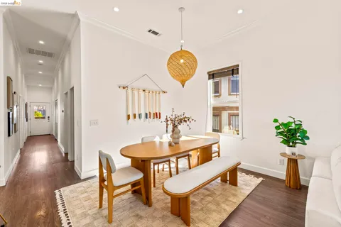 a kitchen with stainless steel appliances granite countertop a sink a stove top oven a counter space and cabinets