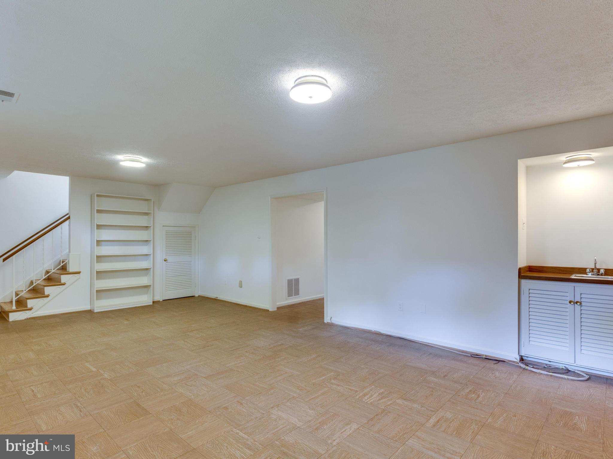 6837 Fairway Street McLean, VA 22101 - Photo 19 of 25 Recreation Room with Wet Bar and Fireplace