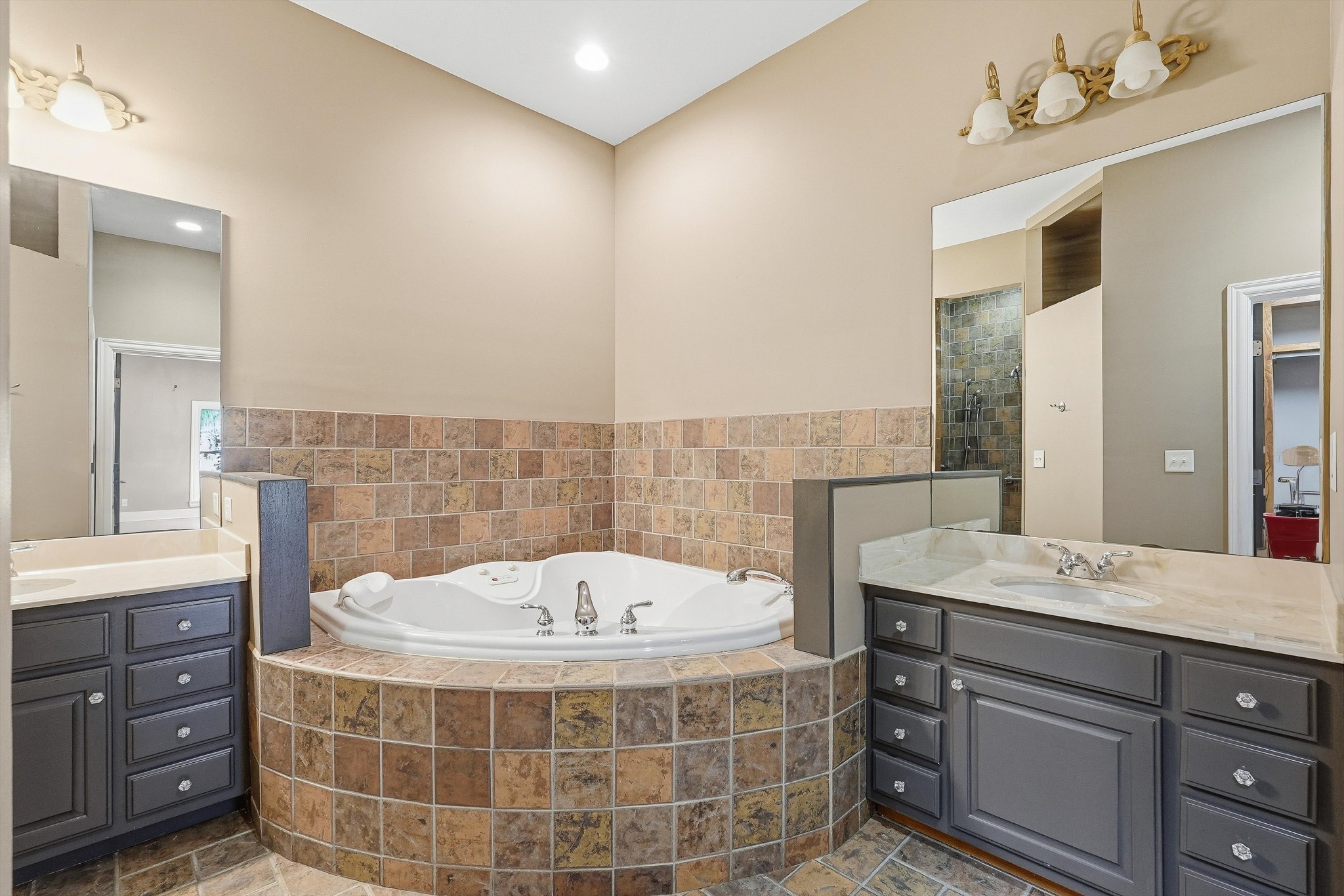 2005 Alan John Way Lebanon, TN 37087 - Photo 16 of 71 a bathroom with a tub sink and mirror