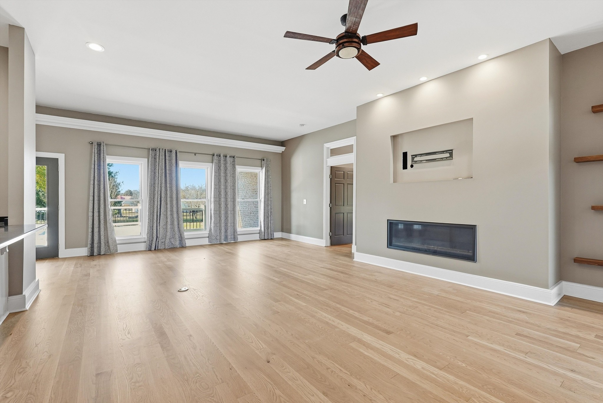 2005 Alan John Way Lebanon, TN 37087 - Photo 20 of 71 a view of an empty room with wooden floor and a window