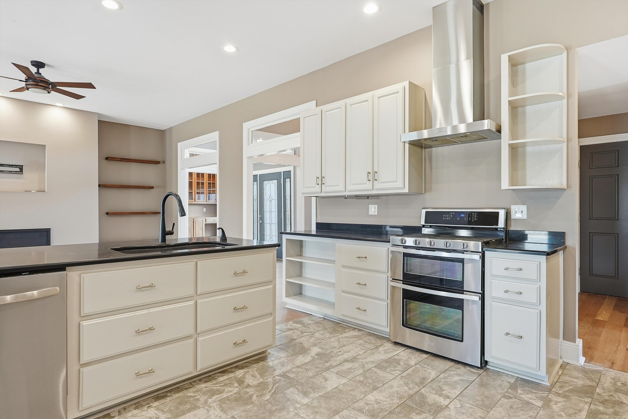 2005 Alan John Way Lebanon, TN 37087 - Photo 29 of 71 a kitchen with granite countertop white cabinets and appliances