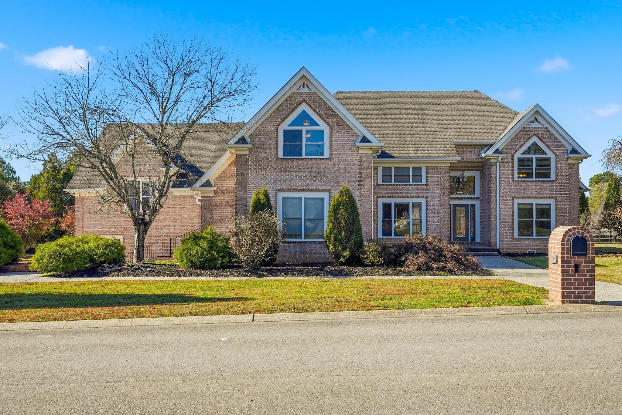 2005 Alan John Way Lebanon, TN 37087 - Photo 4 of 71 a front view of a house with a yard and potted plants