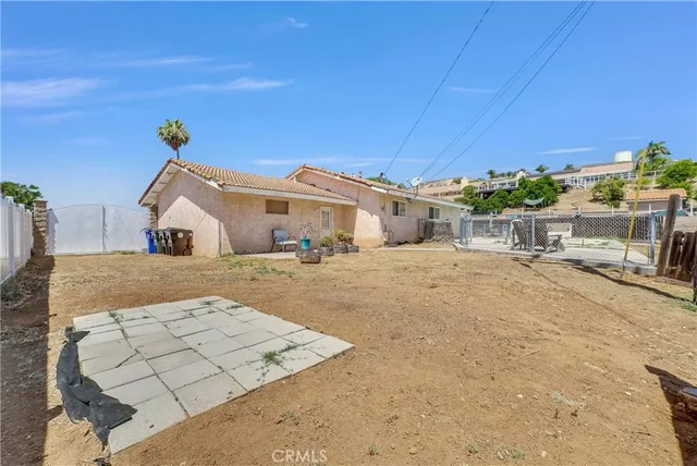 a view of a house with a street
