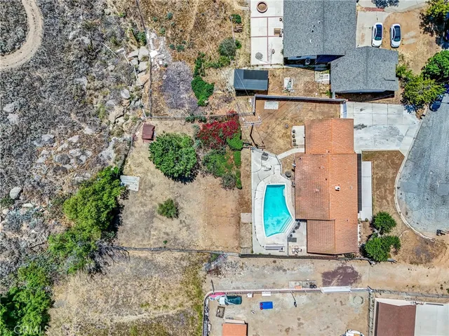 an aerial view of a houses with outdoor space