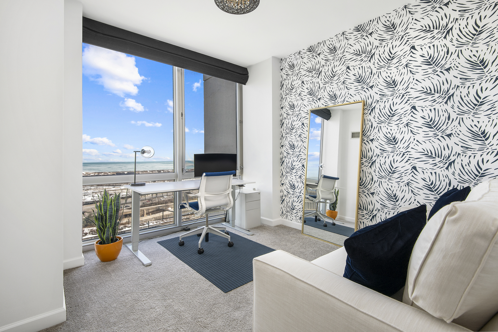 1629 South Prairie Avenue, Unit 1602 Chicago, IL 60616 - Photo 13 of 23 a living room with furniture and a floor to ceiling window
