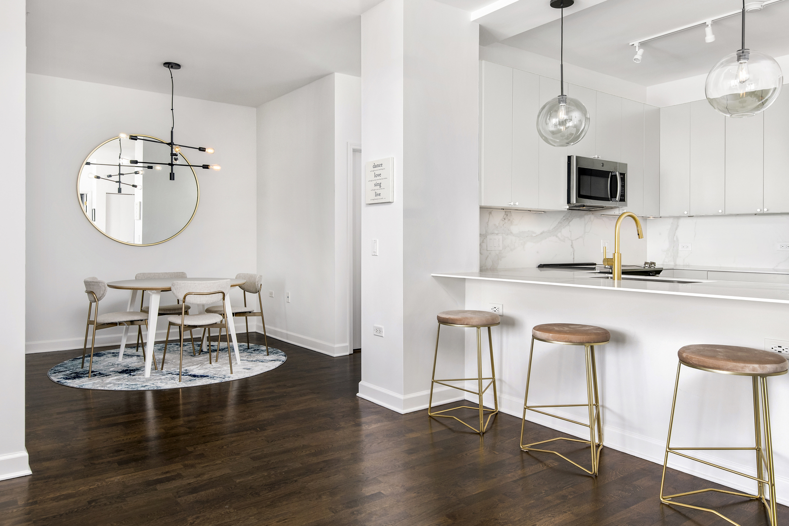 1629 South Prairie Avenue, Unit 1602 Chicago, IL 60616 - Photo 6 of 23 a kitchen with a dining table and chairs
